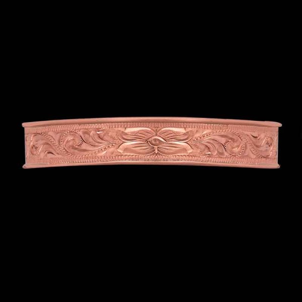 "Our Porter Western Cuff bracelet is a blend of rustic charm and timeless Western elegance. Crafted with intricate, hand-engraved scrolls and a gorgeous flower detail on a Copper base.

Size: 6""x0.5"" 

Customize with your le